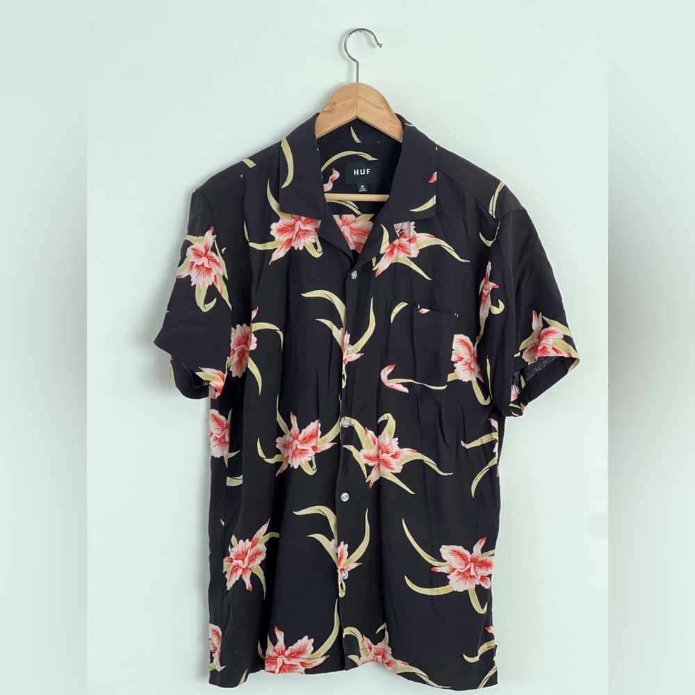 HUF short-sleeve button-up. Size M. Black with pink and green floral design.